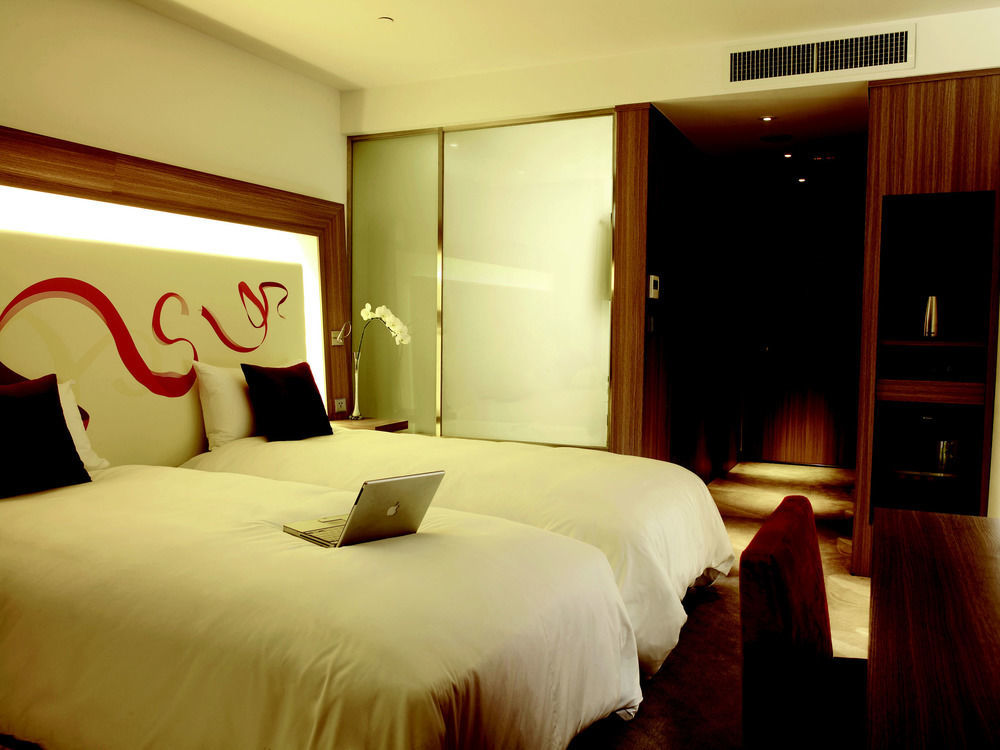 Готель Hyatt Regency Taoyuan International Airport Екстер'єр фото A room at the hotel