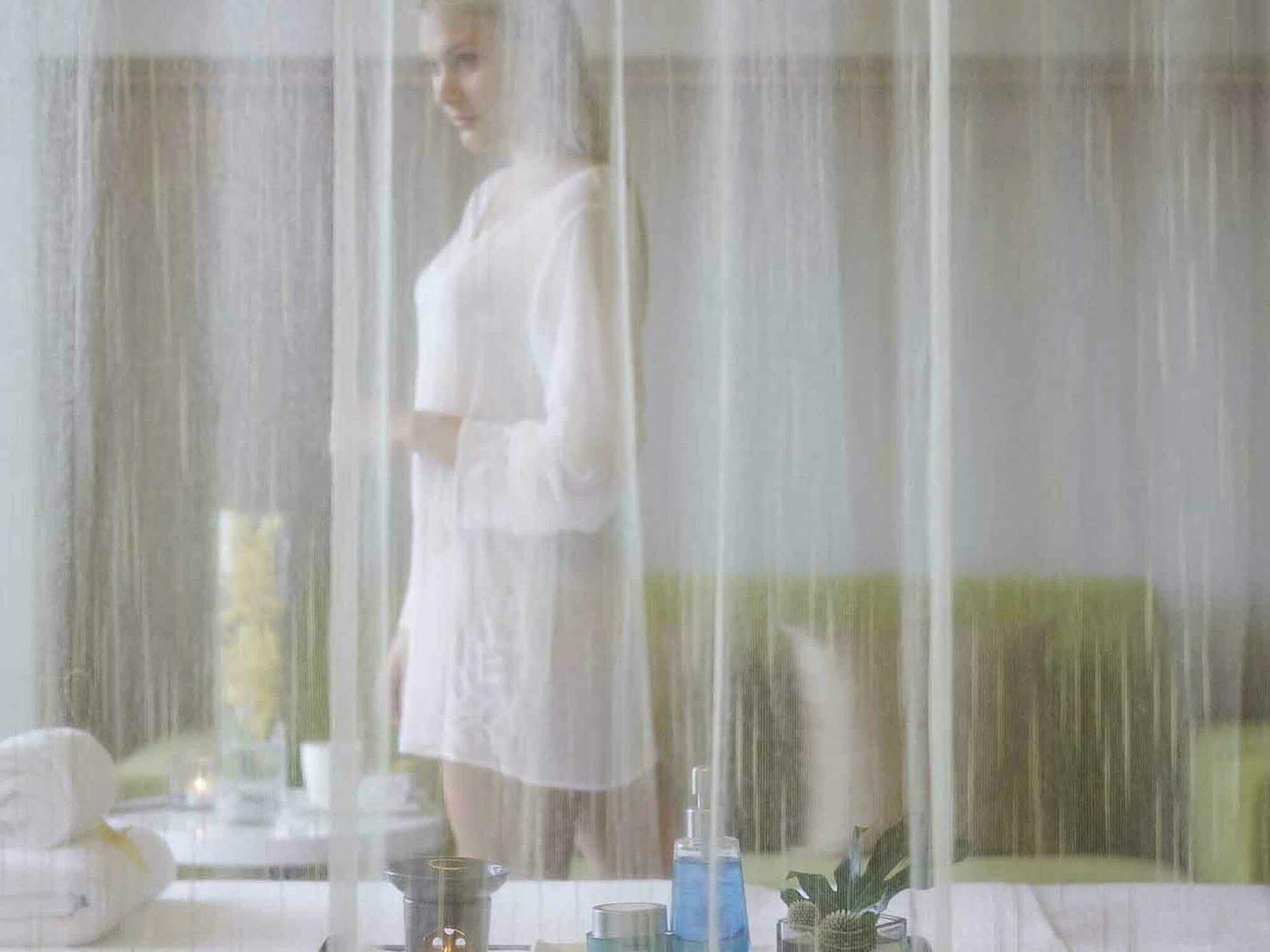 Готель Hyatt Regency Taoyuan International Airport Екстер'єр фото A woman in a spa